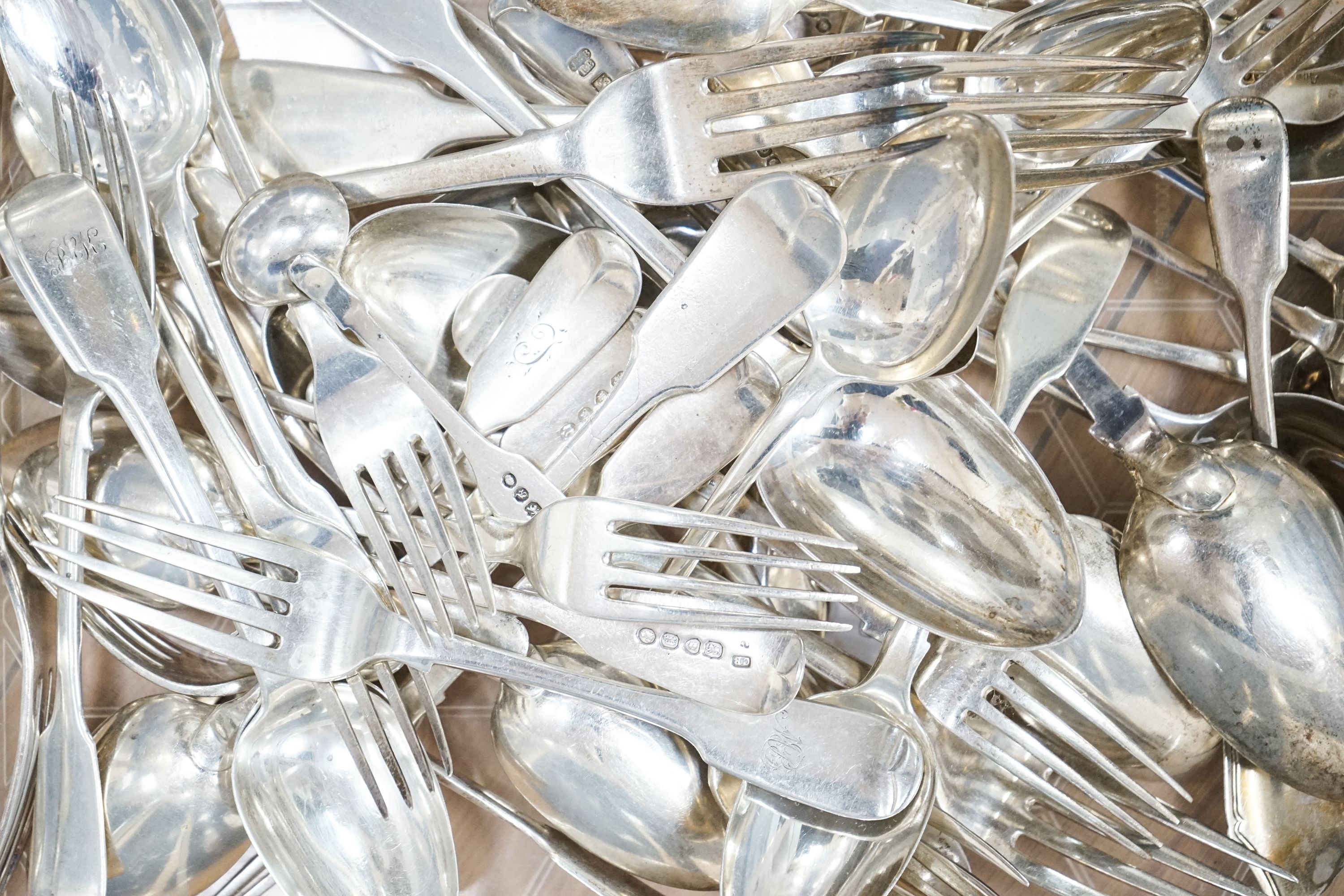 A mixed quantity of assorted mainly 19th century silver flatware, various dates, maker's and patterns, 65.5 oz.